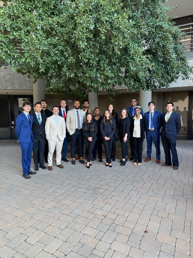 Team under ivy pergola